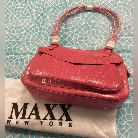 Maxx New York Handbags - 💛TODAY***$29***NWT Maxx New York pink 100% embossed crocodile leather purse.